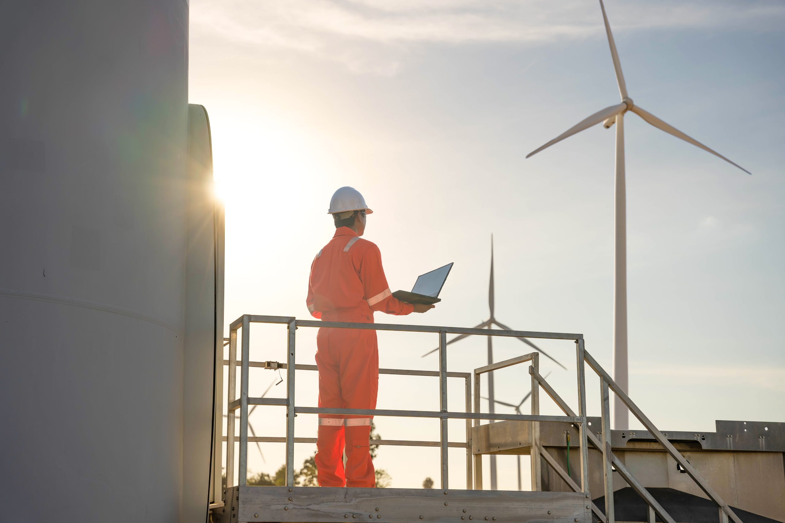 vecteezy_man engineer working and holding the laptop for check_8178316 scaled